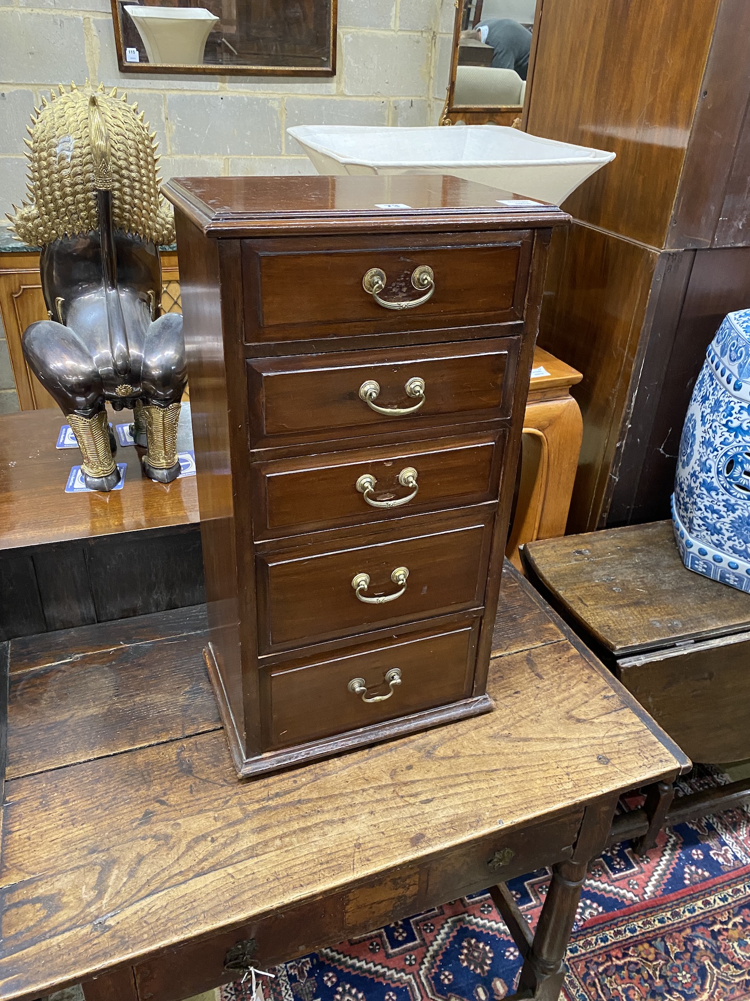 An early 20th century mahogany five drawer small chest, adapted, width 38cm, depth 26cm, height 72cm